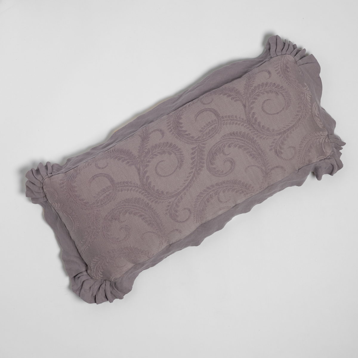 Marisette Throw Pillow | French Lavender | an overhead shot of an organic cotton damask throw pillow against a white background.