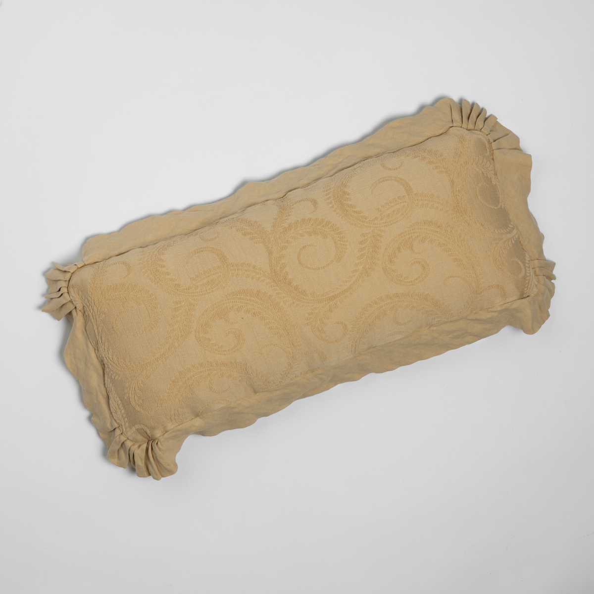 Marisette Throw Pillow | Honeycomb | an overhead shot of an organic cotton damask throw pillow against a white background.