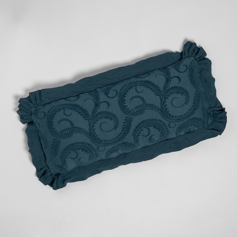 Marisette Throw Pillow | Midnight | an overhead shot of an organic cotton damask throw pillow against a white background.
