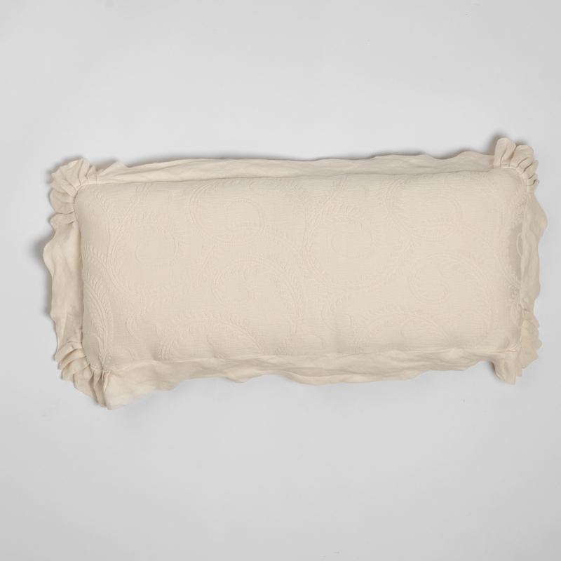Marisette Throw Pillow | Natural | an overhead shot of an organic cotton damask throw pillow against a white background.