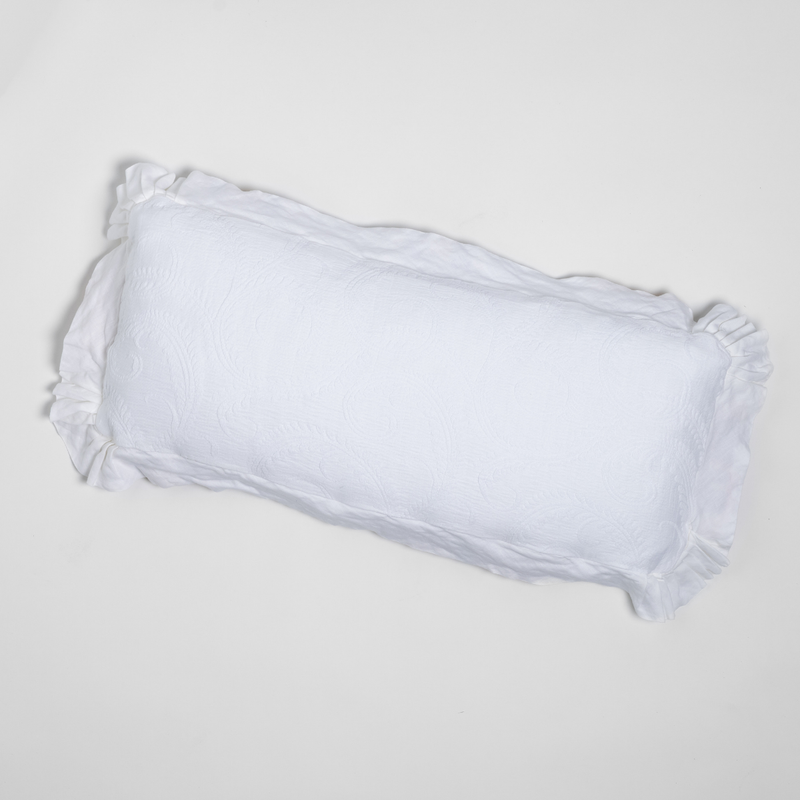 Marisette Throw Pillow | White | an overhead shot of an organic cotton damask throw pillow against a white background.