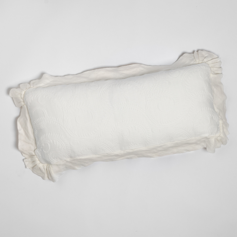 Marisette Throw Pillow | Winter White | an overhead shot of an organic cotton damask throw pillow against a white background.