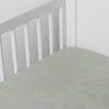 Mirabella Baby Bundle - Holiday Release | Eucalyptus | silk and tencel™ blend jacquard crib sheet shot from above at a slight angle into the corner of a white crib.
