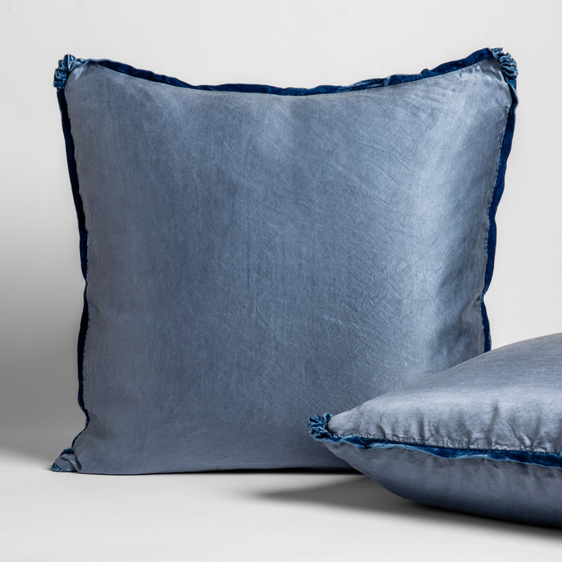 Paloma Sham | Tahoe Blue | Shams leaning upright on white sheeting against a white background.