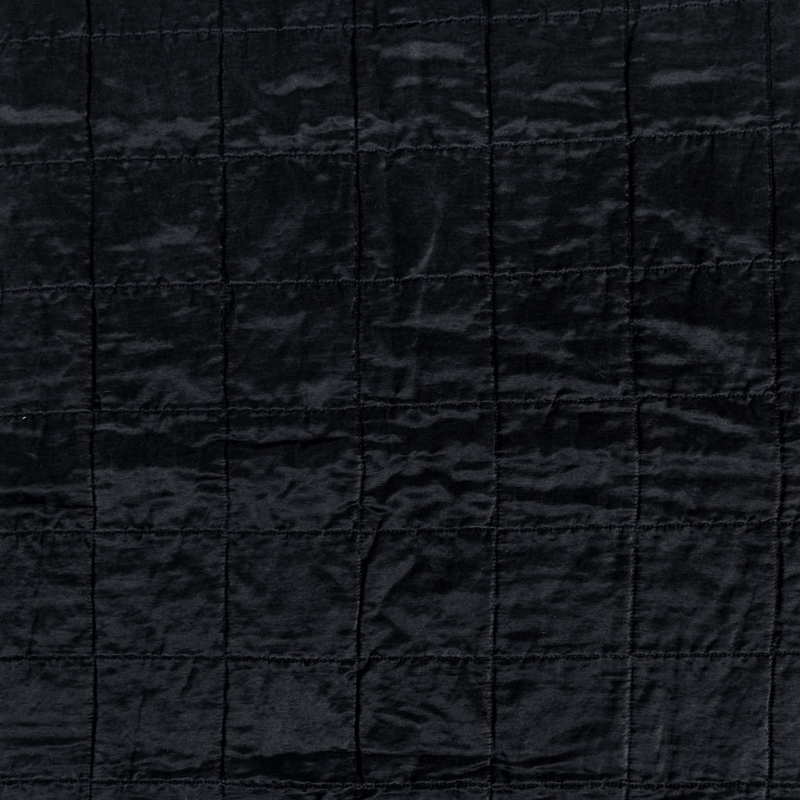 Sel Sham | Corvino | a shot of square-quilted charmeuse in corvino, our classic black.