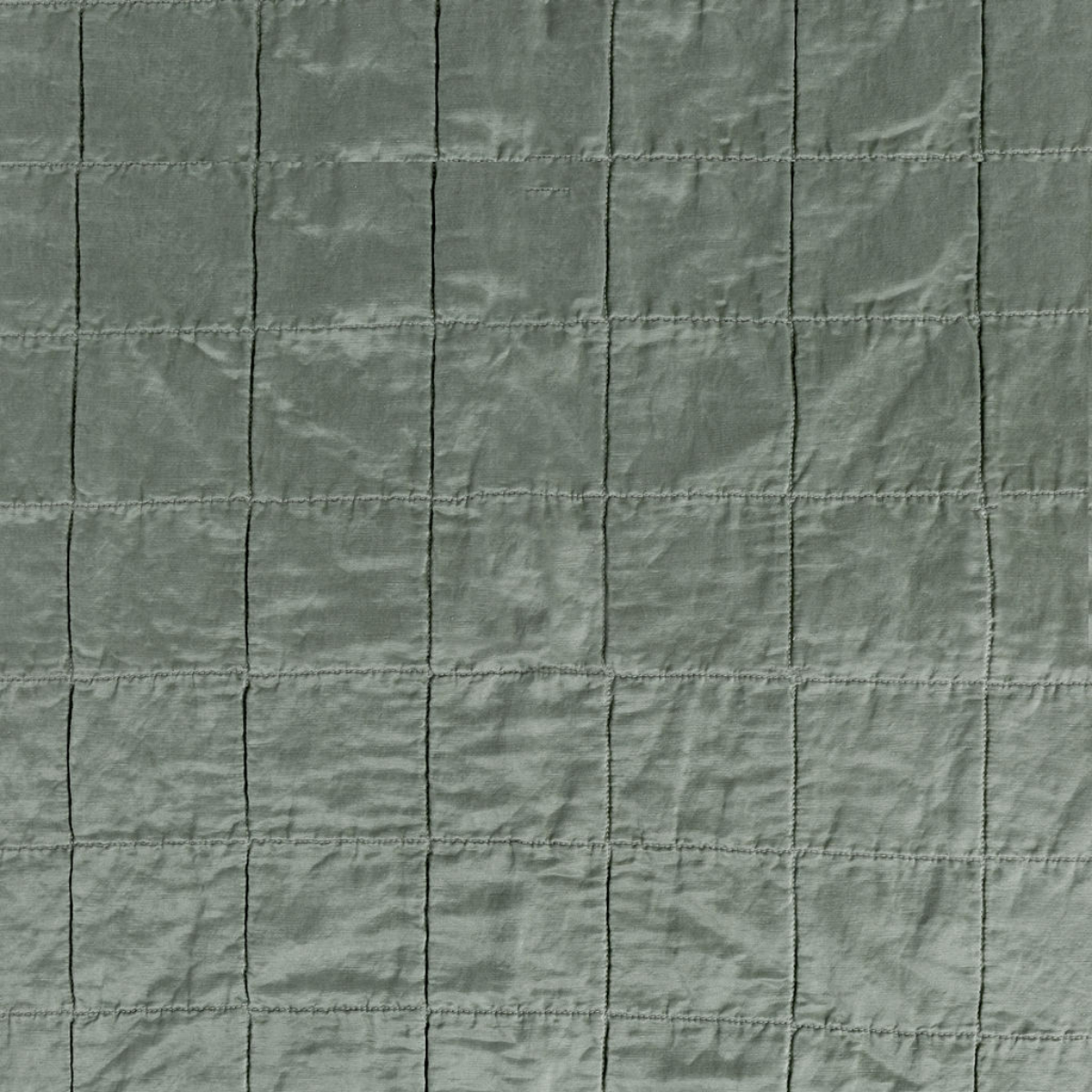 Sel Sham | Eucalyptus | a shot of square-quilted charmeuse in eucalyptus, a soft light green.