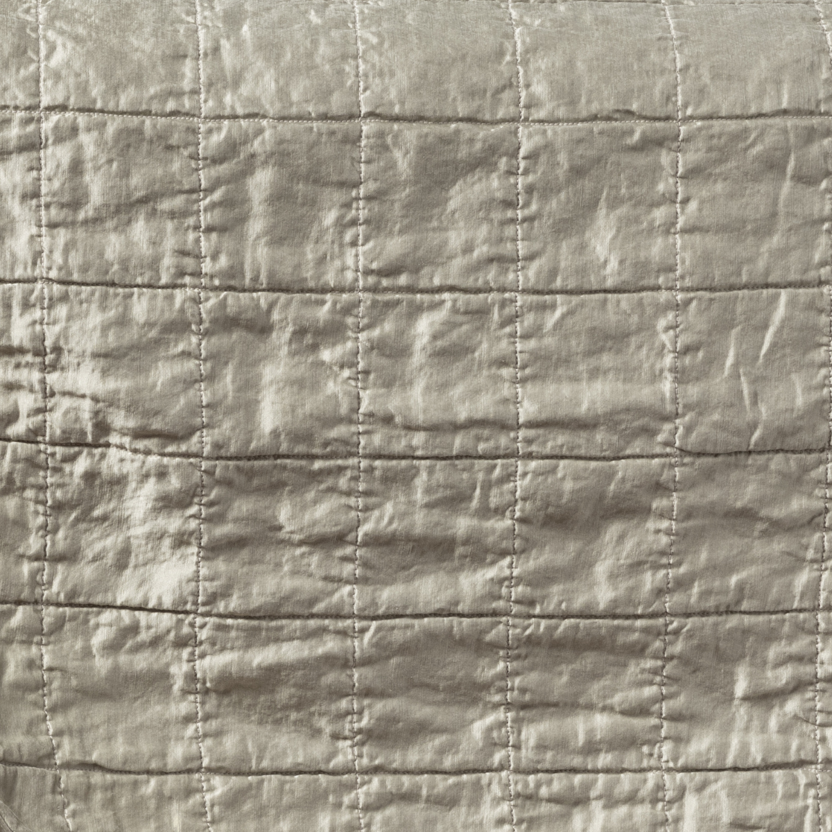 Sel Sham | Fog | a shot of square-quilted charmeuse in fog, a soft mid-tone grey