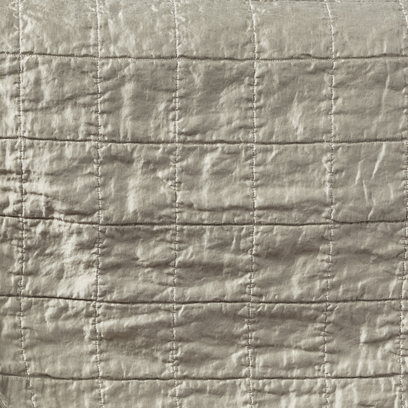 Sel Sham | Fog | a shot of square-quilted charmeuse in fog, a soft mid-tone grey