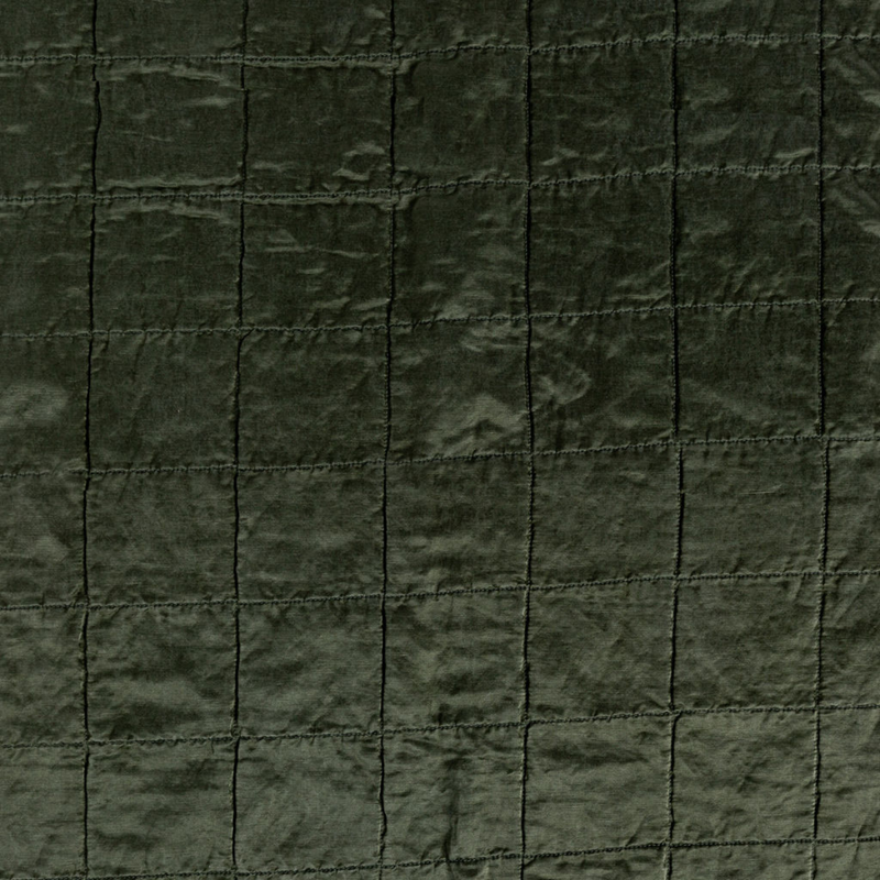 Sel Sham | Juniper | a shot of square-quilted charmeuse in juniper, a deeply saturated dark green.