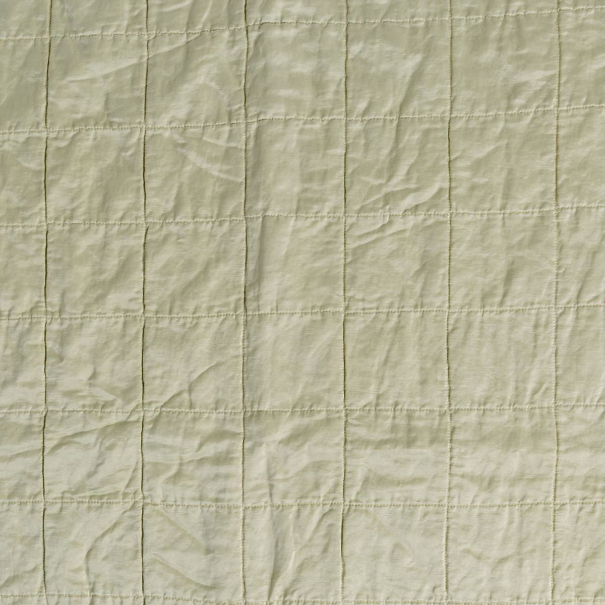 Sel Sham | Parchment | a shot of square-quilted charmeuse in parchment, a warm antiqued cream