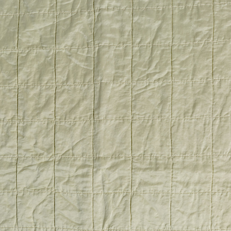 Sel Sham | Parchment | a shot of square-quilted charmeuse in parchment, a warm antiqued cream