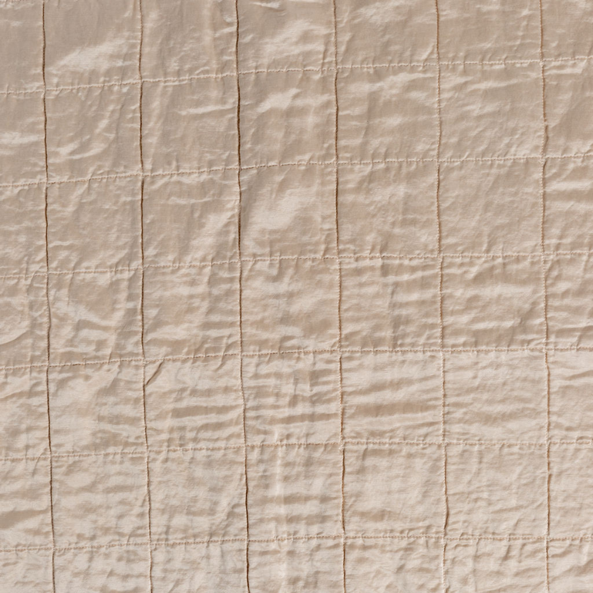 Sel Sham | Pearl | A shot of square-quilted charmeuse in pearl, a soft rose pink tone.
