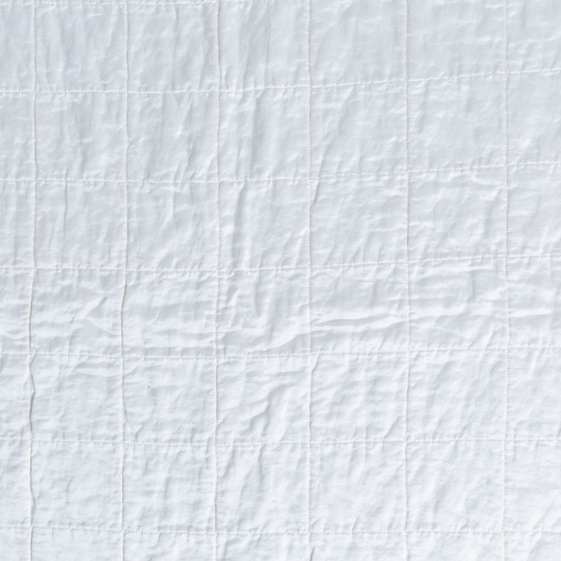 Sel Sham | White | a shot of square-quilted charmeuse in white.