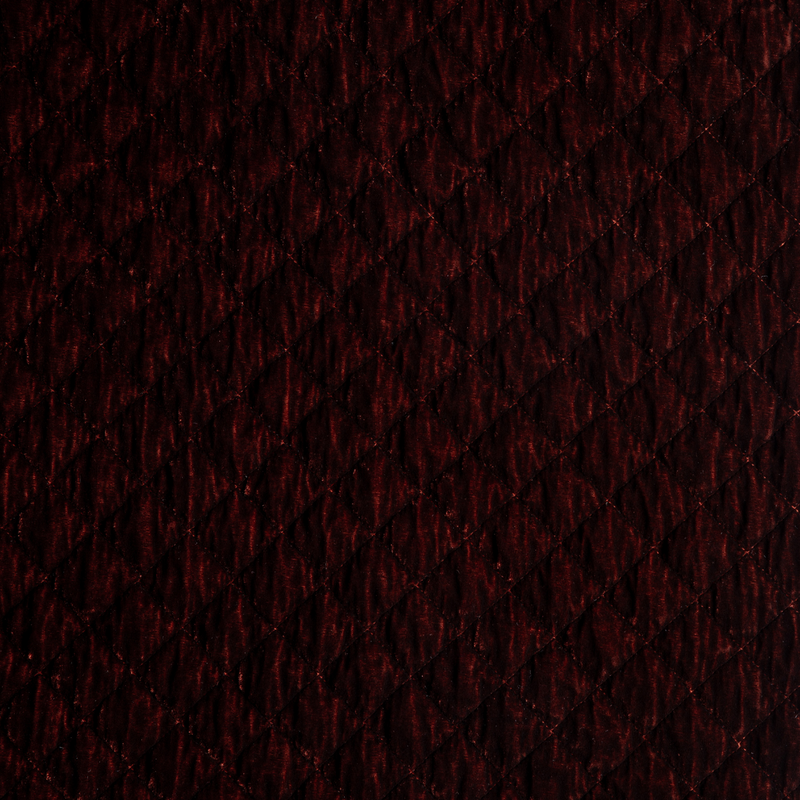 Silk Velvet Quilted Sham | Autumn | A close-up of Silk Velvet Quilted fabric in the colorway, Autumn, a rich terracotta tone.