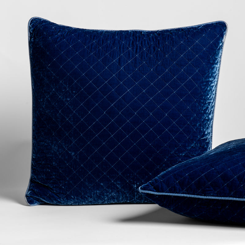 Silk Velvet Quilted Sham | Tahoe Blue | 2 square Silk Velvet Quilted Throw Pillows in Tahoe Blue, a saturated blue like a crystal clear sky, shown against a white background. 