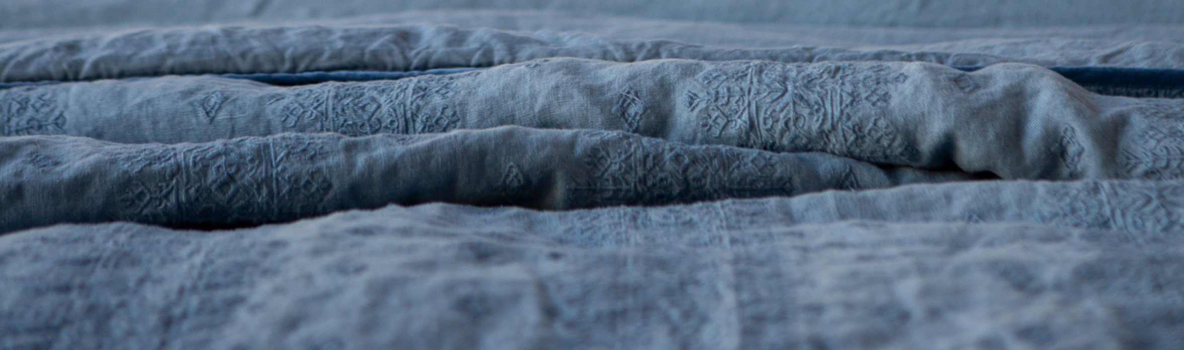 A close up of a tahoe blue textured fabric