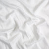 Madera Luxe Crib Sheet | White | A close up of Tencel™ fabric in classic white.
