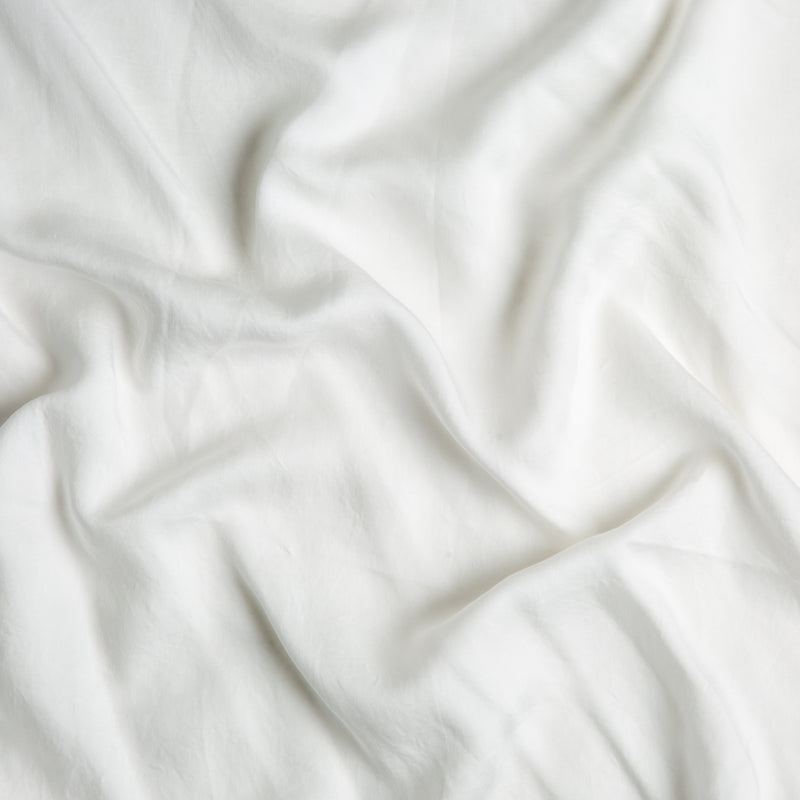 Madera Luxe Crib Sheet | Winter White | A close up of Tencel™ fabric in winter white, softer and warmer in tone than classic white.