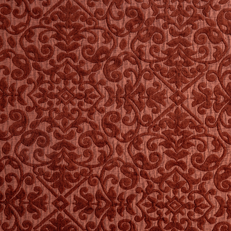 Vienna Coverlet | Autumn | A close-up of Vienna fabric in the colorway, Autumn, a rich terracotta tone.