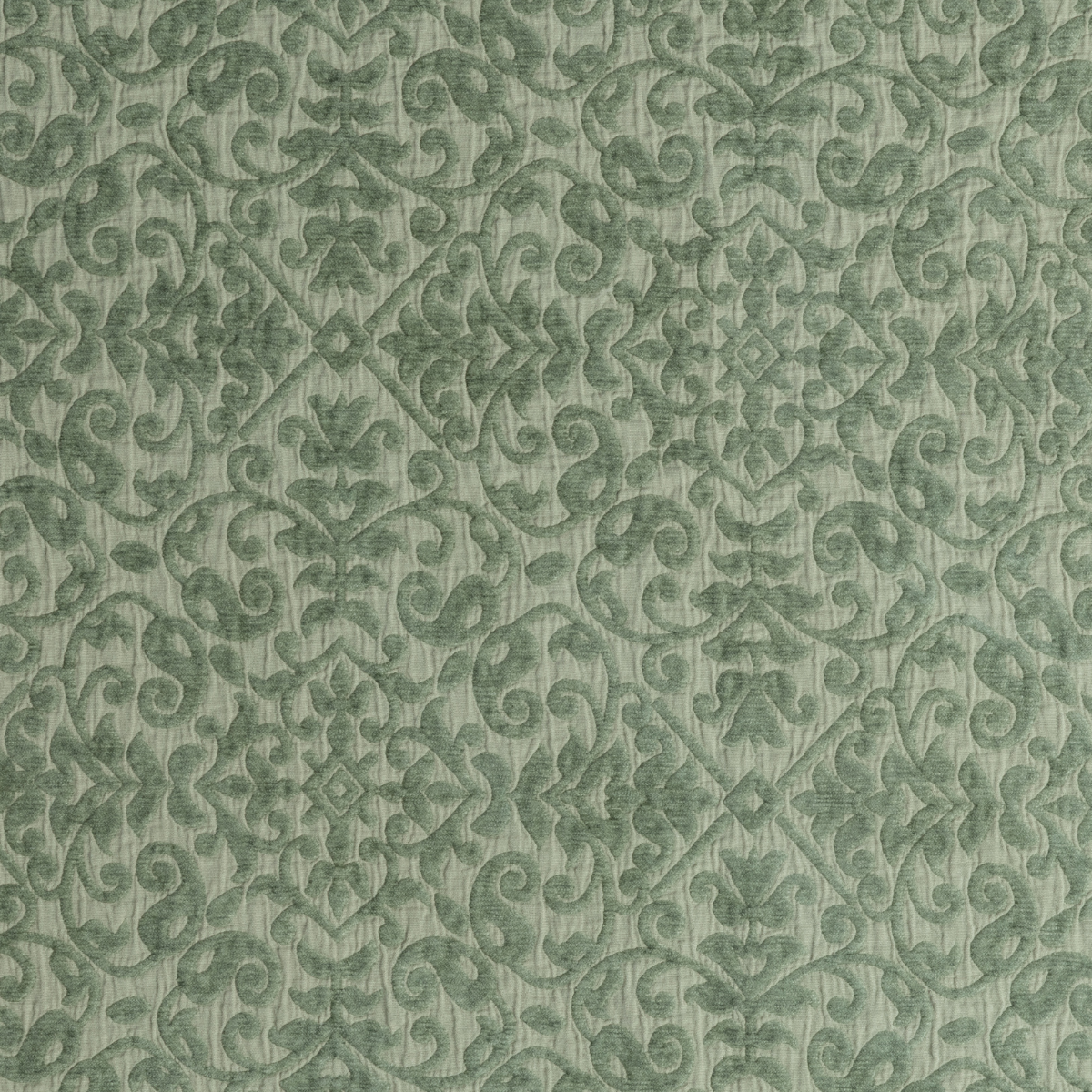 Vienna Coverlet | Desert Sage | a close-up shot of vienna fabric in desert sage, a serenely elegant green, offering a hushed hue.