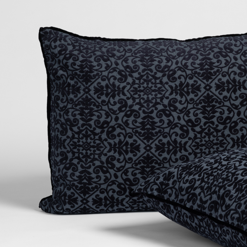 Slate | matching pair of vienna shams in slate, a polished dusky dark blue, shown against a white background.
