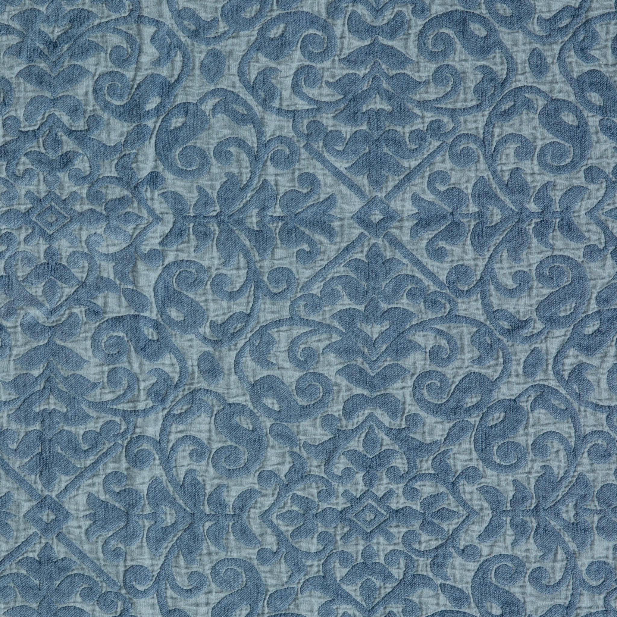 Vienna Twin Coverlet | Tahoe Blue | A close up of cotton chenille fabric in the colorway, Tahoe Blue, a saturated blue like a crystal clear sky.