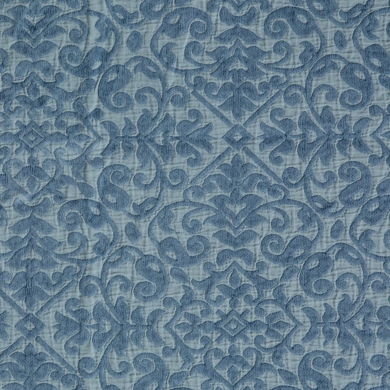 Vienna Coverlet | Tahoe Blue | A close up of cotton chenille fabric in the colorway, Tahoe Blue, a saturated blue like a crystal clear sky.