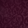 Adele Coverlet | Fig | A close up of Adele fabric in fig, a richly saturated purple-garnet.