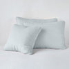 Austin Sham | Cloud | Midweight linen shams in cloud colorway shown leaning upright on white background.