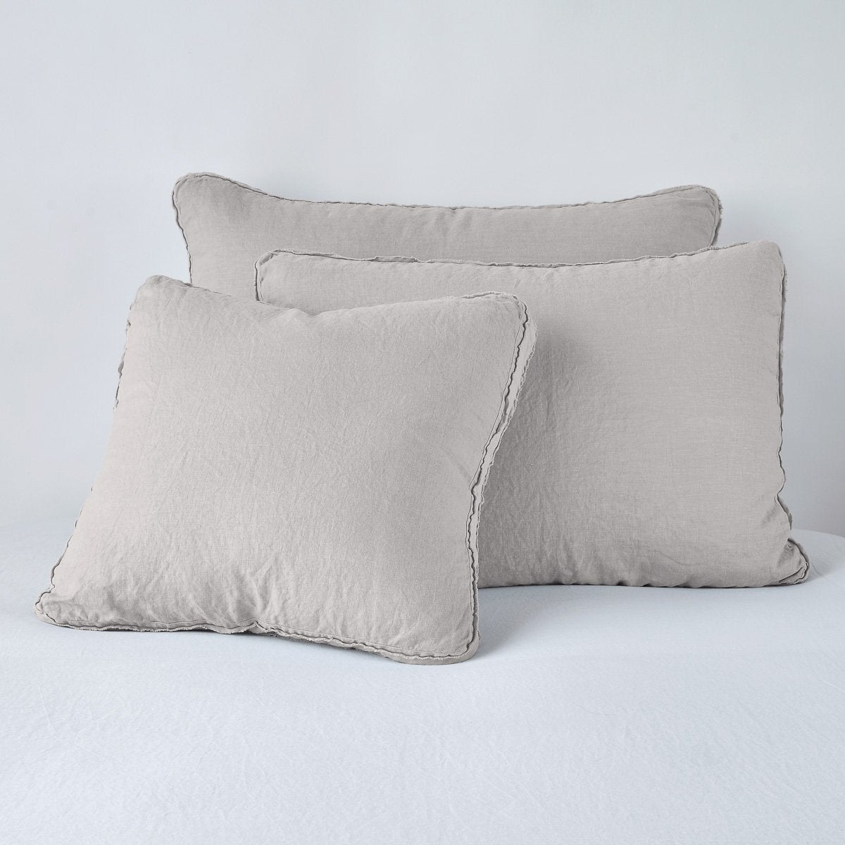 Austin Sham | Fog | Midweight linen shams in fog colorway shown leaning upright on white background.