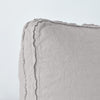 Fog | Close up angle of the corner of an Austin sham in fog, highlighting the raw edge trim on either side of the gusset.