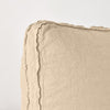 Austin Throw Pillow | Honeycomb | close up of midweight linen pillow corner with raw edges trimming its gusset.