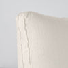 Parchment | Close-up angle of the corner of an Austin sham, highlighting the raw edge trim on either side of the gusset.