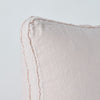Pearl | Close-up angle of the corner of an Austin sham, highlighting the raw edge trim on either side of the gusset.