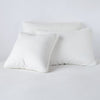 Austin Sham | Winter White | Midweight linen shams in winter white colorway shown leaning upright on white background.