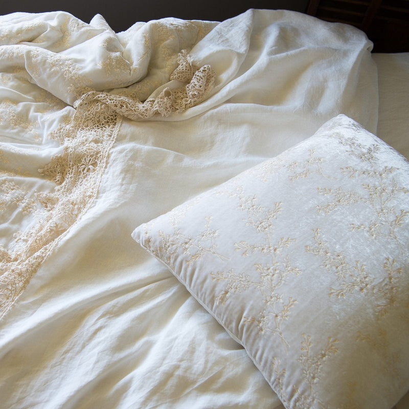 Lynette Sham | Lynette's gold embroidery in winter white beautifully complements our linen with cotton lace in the same hue - close-up overhead angle.