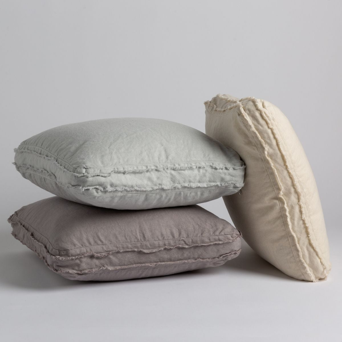 https://www.bellanottelinens.com/cdn/shop/products/Bella-Notte-2023-Gift-Guide-Austin-Cushions-Eucalyptus-Moonlight-Parchment_2048x2048.jpg?v=1703605919