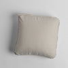 Austin Throw Pillow | Parchment | midweight linen 18x18 inch throw pillow shot from overhead against a white background.