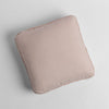 Austin Throw Pillow | Pearl | midweight linen 18x18 inch throw pillow shot from overhead against a white background.