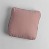Austin Throw Pillow | Rouge | midweight linen 18x18 inch throw pillow shot from overhead against a white background.