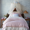 Linen Twin Duvet Cover | A neutral linen duvet cover is an essential layer under a soft pink cotton damask blanket.