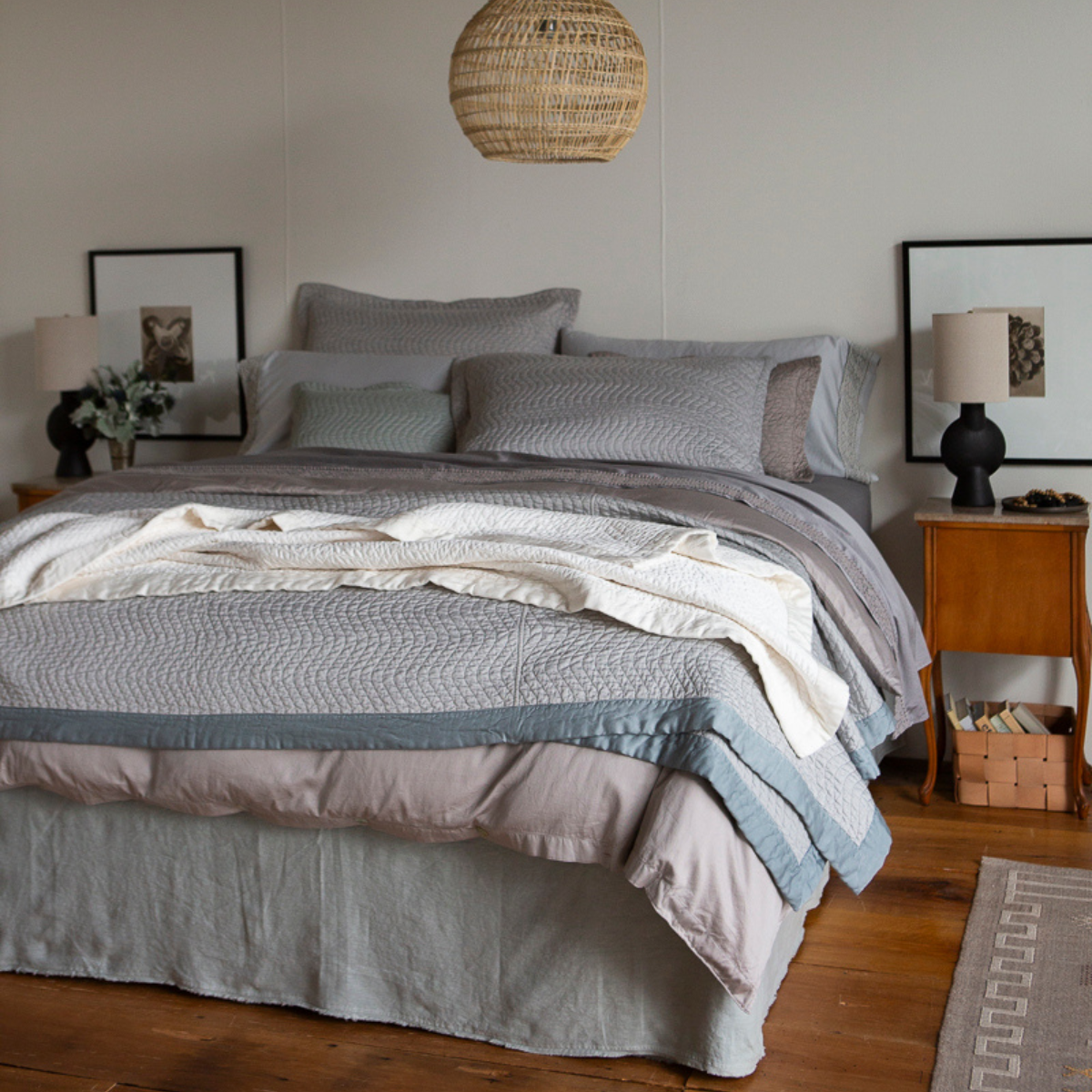 Cirillo Coverlet | king sized bed dressed in cotton sateen, quilted and unquilted - cool and neutral tones on the bed with warm room accents.