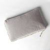 Harlow Throw Pillow | Fog | cotton velvet 15x24 pillow shot from overhead against a white background.