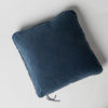 Harlow Throw Pillow | Midnight | Cotton velvet 24 by 24 pillow on a plain background - overhead view.