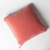 Harlow Throw Pillow | Poppy | Cotton velvet 24 by 24 pillow on a plain background - overhead view.