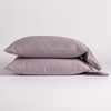 Bria Standard Pillowcase (Single) | French Lavender | two cotton sateen sleeping pillows, stacked neatly against a white backdrop.