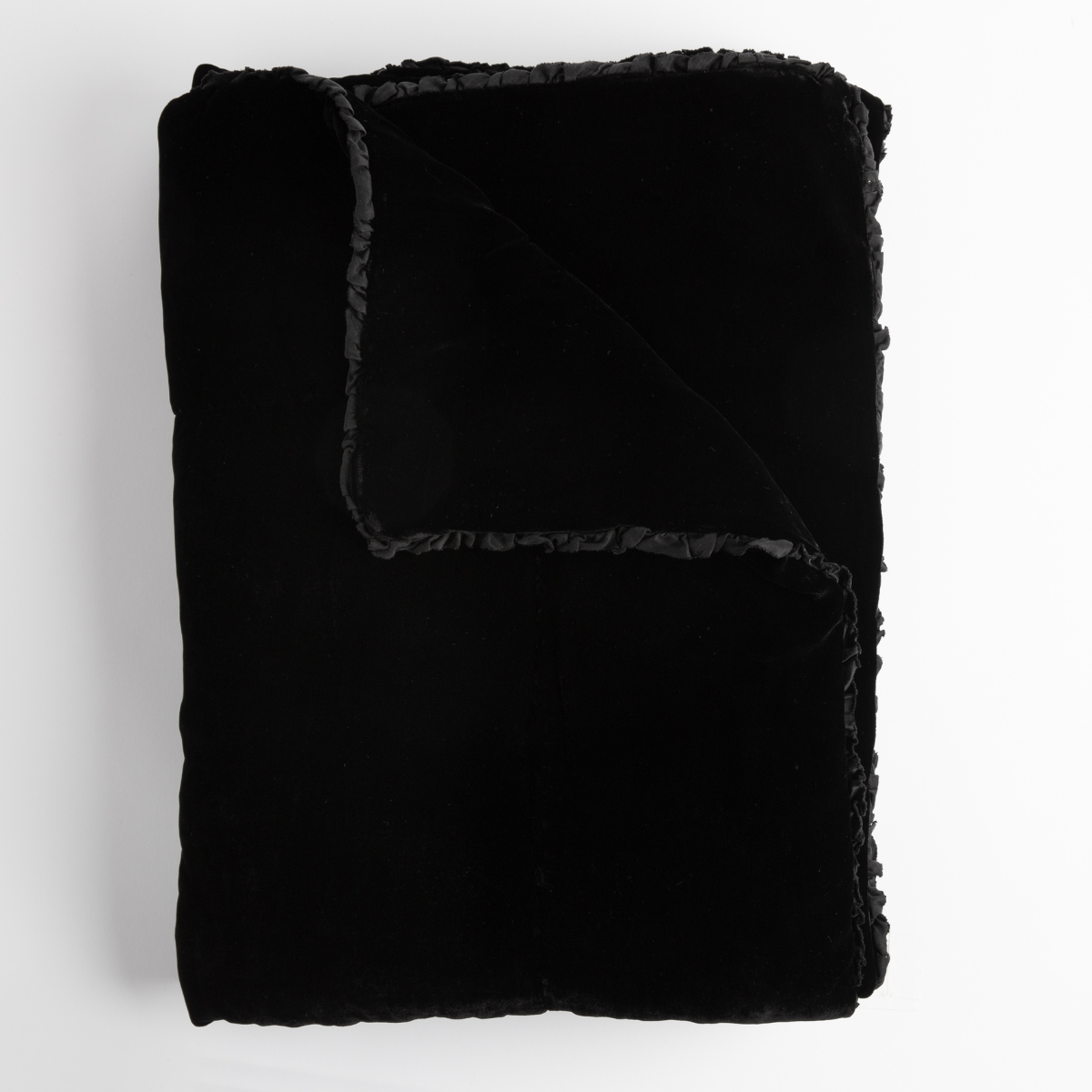 Carmen Blanket | Corvino | folded blanket with corner fold to show trim detail.