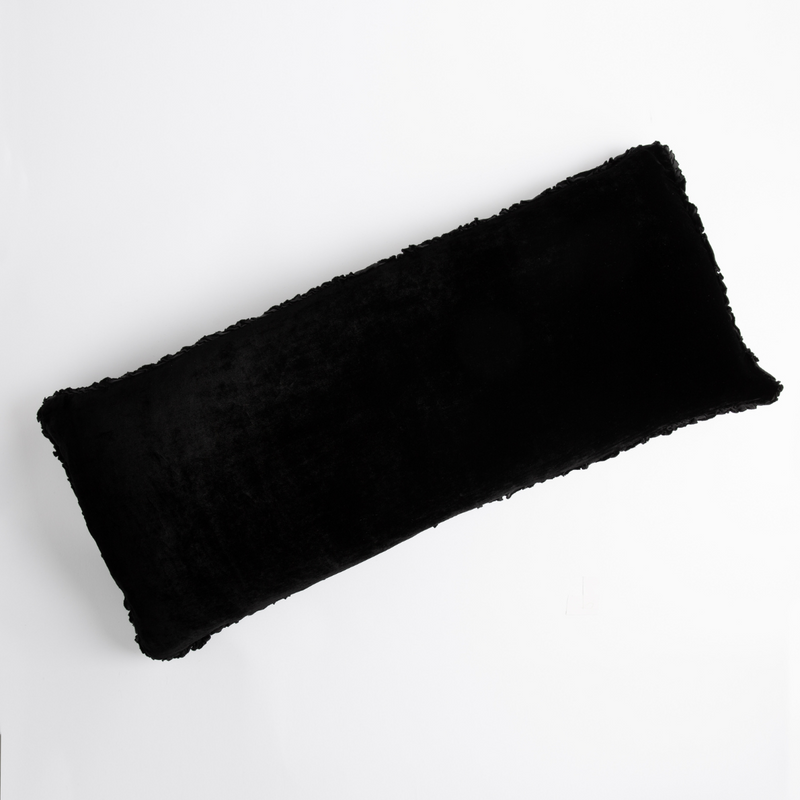 Carmen Throw Pillow | Corvino | pillow laid on a plain white background, petite ruffle detail on all four sides.