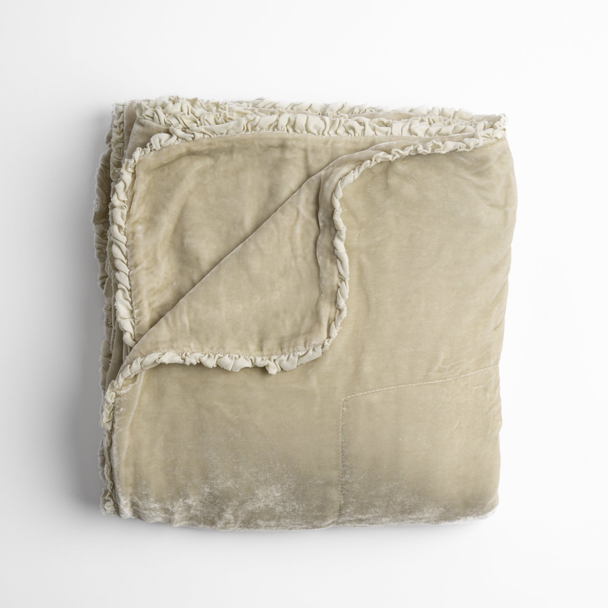 Carmen Blanket | Parchment | silk velvet unfilled throw blanket with a petite charmeuse ruffle trim, overhead on a white background.