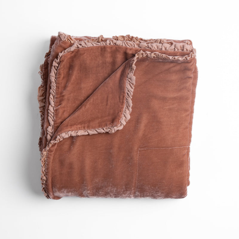 Carmen Blanket | Rouge | silk velvet unfilled throw blanket with a petite charmeuse ruffle trim, overhead on a white background.